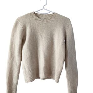Joie soft cashmere sweater..a creamy pale beige shade. Women’s size Small